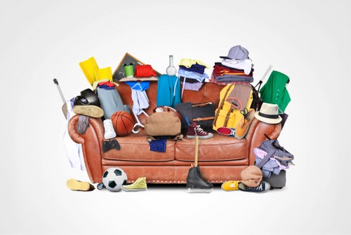 Crowded loft being cleared by professionals